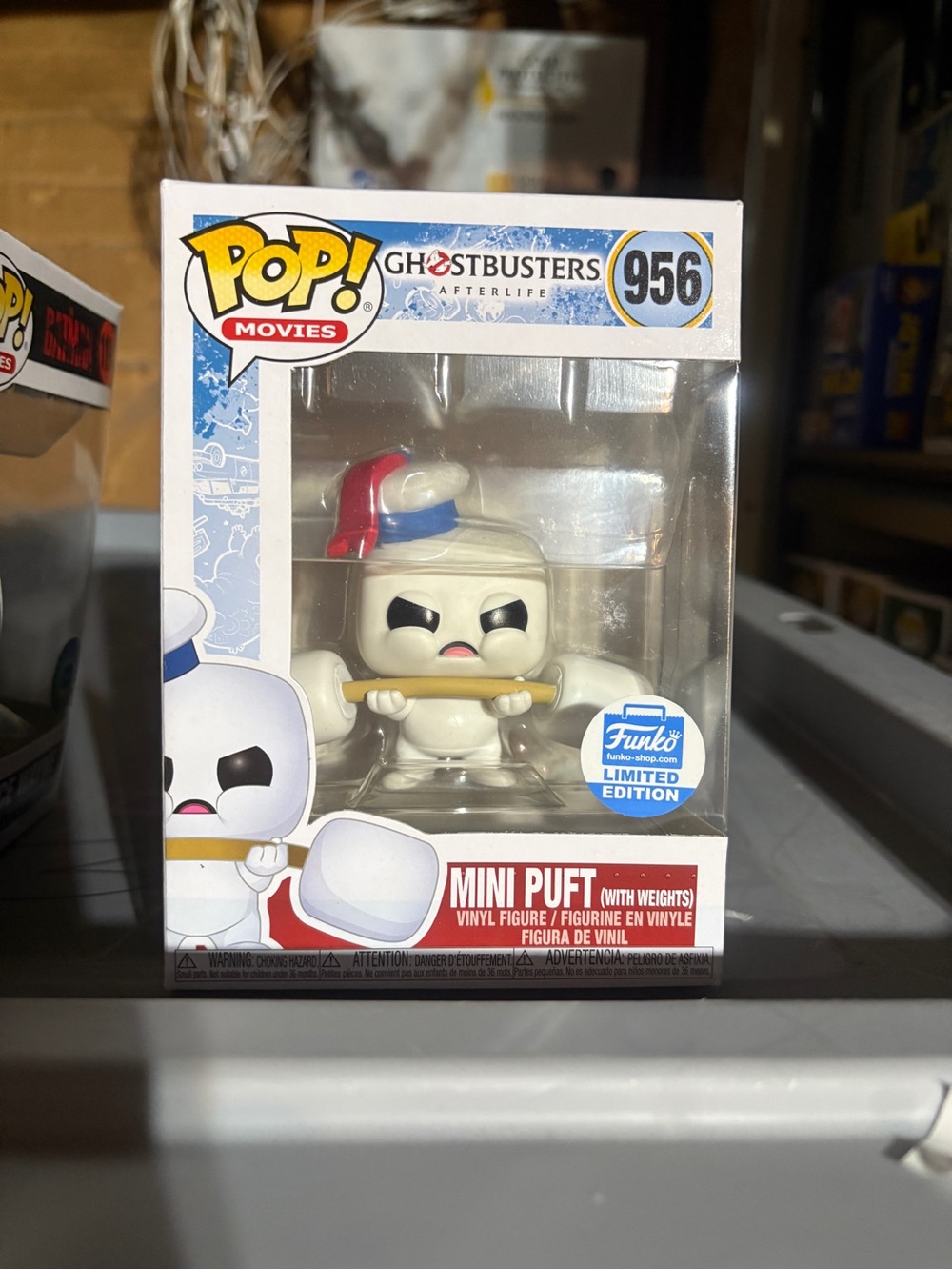 Funko Movies Ghostbusters Afterlife Mini Puft lifting weights
